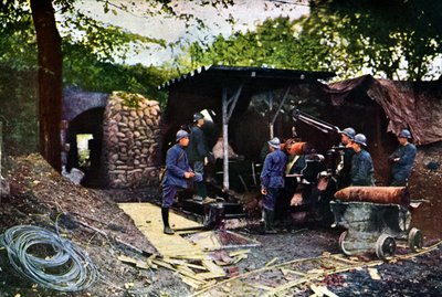 A French battery of heavy guns under camouflage netting behind a wall, Verdun, September 1916 by Jules Gervais Courtellemont